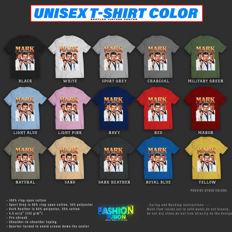 May include: A display of unisex t-shirts in various colors, each featuring a graphic of a man's face with the name "MARK" above it. Colors include black, white, sport grey, charcoal, military green, light blue, light pink, navy, red, maroon, natural, sand, dark heather, royal blue, and yellow.