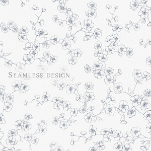 May include: A seamless design featuring delicate, light blue floral branches with small blossoms against a white background. The text "SEAMLESS DESIGN" is displayed in a simple font. This pattern is suitable for various applications.