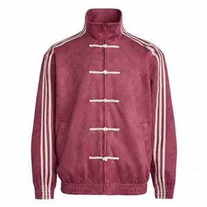 May include: A maroon jacket with a high collar and white stripes down the sleeves. The jacket has white toggle closures down the front. The jacket has a ribbed hem and cuffs.
