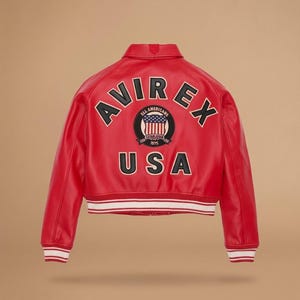 May include: A red leather jacket with the word "AVIREX" arched across the shoulders in black lettering. Below the word "AVIREX" is a circular patch with the words "ALL AMERICANS" and "USA" in black lettering. The jacket has a white and red striped hem.