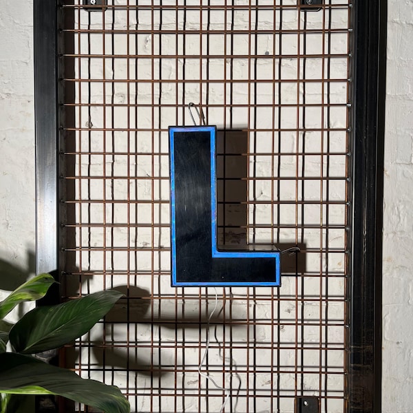Vintage illuminated letter L – original neon sign | Industrial decor