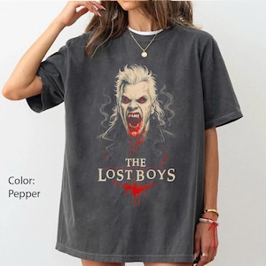 May include: A rustic wooden sign with the text "Welcome to our home" in white lettering. The sign features a distressed finish and a simple, inviting design, perfect for entryway decor.