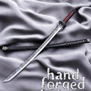 May include: A hand-forged katana sword with a black handle wrapped with red and black cord. The blade is silver and the scabbard is black. The text "hand forged katana" is visible in the image.