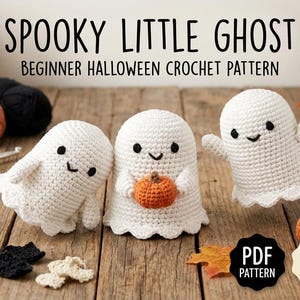 May include: Three white crocheted ghost figures with black eyes and mouths, one holding a small orange pumpkin. The text reads SPOOKY LITTLE GHOST BEGINNER HALLOWEEN CROCHET PATTERN, PDF PATTERN, 4-5 IN, and EASY AMIGURUMI. Includes yarn and a hook.