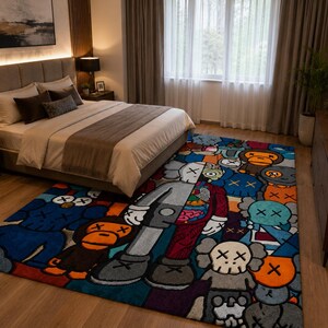 May include: A colorful, rectangular area rug with a cartoon character design in a bedroom setting. The rug features a variety of characters in shades of blue, orange, gray, and red. The bedroom includes a bed, dresser, and artwork.