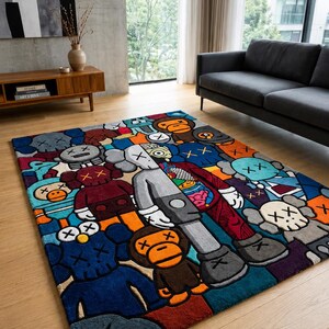 May include: A colorful area rug featuring a repeating pattern of cartoon figures in various colors. The rug has a rectangular shape and is placed on a hardwood floor. The figures include characters with X-shaped eyes and crossbones.