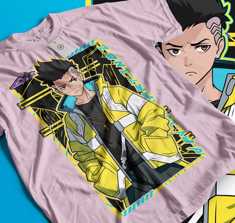 Pode incluir: Camiseta rosa claro com um personagem de anime estilizado em uma jaqueta amarela e branca. O gr&aacute;fico inclui a palavra "ARTIME" em azul e amarelo. Uma segunda imagem do personagem &eacute; vis&iacute;vel.