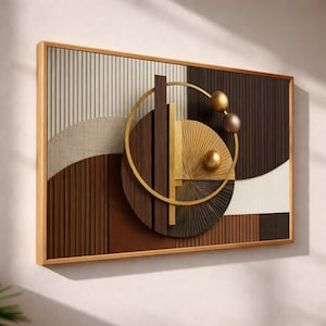 Puede incluir: Arte mural geométrico abstracto en un marco de madera. La obra presenta un diseño en capas con varias texturas y colores, incluyendo marrón, beige y dorado. El diseño incorpora círculos, líneas y esferas.