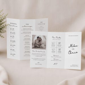 May include: A tri-fold wedding program printed on white cardstock with black text. The layout includes a wedding timeline, the entourage list, a black and white photograph of a couple, fan facts, and the names Mika and Chris with the date June 27.
