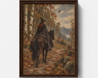May include: A framed oil painting depicting a figure in a black cloak and pointed hat riding a dark horse along a path through an autumn forest with birch trees, fallen leaves, a flying bird, and a distant castle under a cloudy sky.