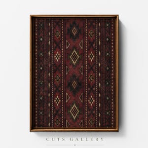 May include: A rectangular wall art print in a dark wood frame featuring a deep red background with vertical stripes of black and cream geometric diamond and floral patterns. The design displays a repeating symmetrical motif across the surface.