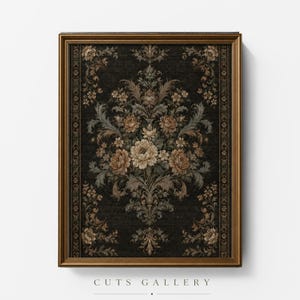 May include: A framed wall art print featuring a dark charcoal background with a symmetrical floral arrangement in shades of beige, cream, and muted brown. The design includes intricate acanthus leaves and blossoms, enclosed in a gold frame.