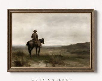 May include: A framed oil painting depicting a lone rider on horseback wearing a wide-brimmed hat, positioned in a vast, muted landscape under a cloudy, overcast sky. The artwork is enclosed in a dark, textured frame with the text CUTS GALLERY.