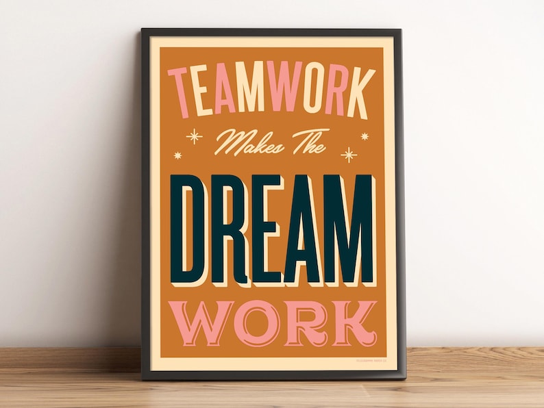May include: A motivational poster with a brown background and black text that reads "Teamwork Makes The Dream Work". The words "Teamwork" and "Work" are in pink.