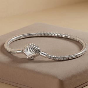 Silver Seashell and Shell Charm Snake Chain Bracelet.