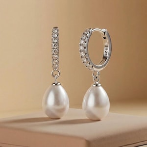 Sterling Silver Pearl Drop Huggie Earrings.