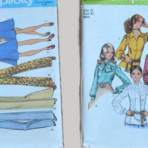 May include: Three vintage sewing pattern envelopes. The left envelope is Butterick 8068 showing robes. The center envelope is Simplicity 7006 featuring various pants and tops. The right envelope is Simplicity 9718 displaying blouses and shirts.