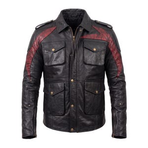 May include: A black leather jacket featuring a pointed collar, a front zipper closure with a snap-button placket, and four front flap pockets with snap buttons. The shoulders and upper chest are accented with dark red panels and epaulets.