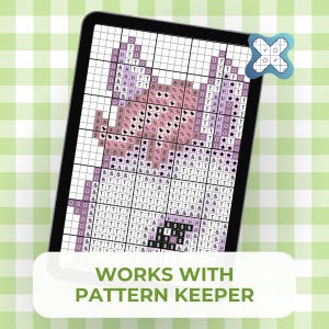 May include: A digital tablet displaying a cross-stitch pattern grid with various symbols and shades of pink and purple. A blue icon with a checkmark and star sits in the corner. The text "WORKS WITH PATTERN KEEPER" is printed in green at the bottom.