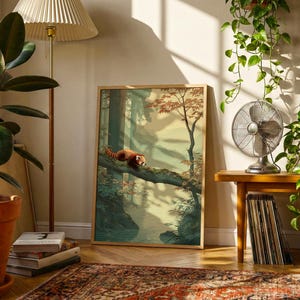 May include: A framed art print featuring a red panda resting on a tree branch in a forest scene. The artwork has a warm color palette with shades of green, brown, and orange. The print is displayed in a room with plants and a vintage fan.