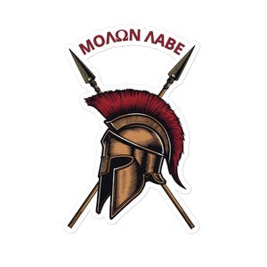 May include: A sticker featuring a Spartan helmet with a red crest, crossed spears, and the text "MOLON LABE" in a curved banner. The design uses brown, red, and white colors, evoking a historical theme.