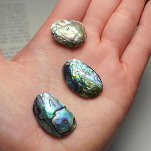 May include: A rustic wooden sign with the text "Welcome to our home" in white lettering. The sign features a distressed finish and a simple, inviting design, perfect for entryway decor.