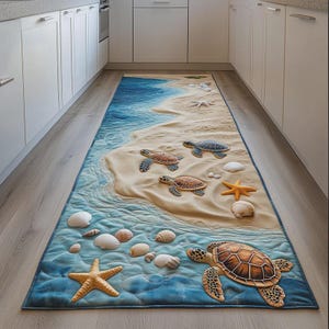 May include: A rectangular rug with a beach scene design. The rug features a blue ocean, sandy beach, seashells, starfish, and sea turtles. The rug is placed in a kitchen setting.