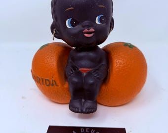 Vintage zwart Florida-oranje Bobble Head Bank-souvenir
