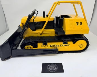 Vintage 1976 Mighty Tonka T-9 bulldozer geperst staal, ongeveer 17 inch lang