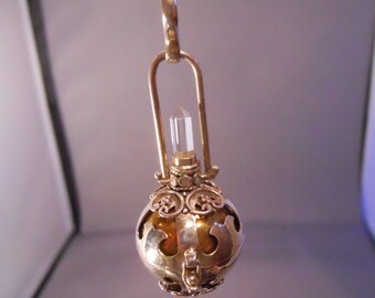 Unique Sterling Silver Harmony Melody Singing Ball Pendant with Clear Crystal Point and Goldtone Ball