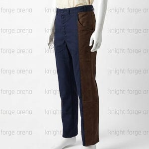 May include: Two-tone pants with a navy blue left leg and a brown right leg. The pants have a button fly and a classic, tailored fit. The garment is displayed on a mannequin against a white background.
