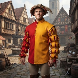 Peut inclure: Un pourpoint &agrave; manches longues pr&eacute;sentant un design divis&eacute; avec un c&ocirc;t&eacute; droit rouge et un c&ocirc;t&eacute; gauche jaune, accentu&eacute; par des manches fendues verticalement r&eacute;v&eacute;lant du tissu rouge. Le v&ecirc;tement comprend une rang&eacute;e de boutons et un chapeau assorti.