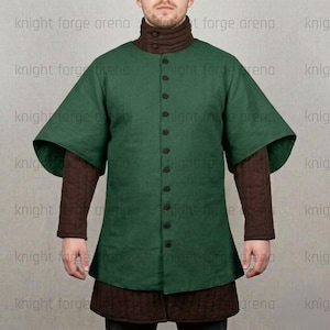 May include: A green medieval tunic with a button-down front and wide sleeves. The tunic is layered over a brown undershirt and a high-collared garment. The text "knight forge arena" is visible in the background.
