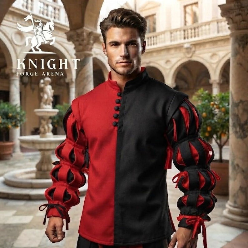 Peut inclure: Une chemise &agrave; manches longues avec un design bicolore, rouge &agrave; gauche et noir &agrave; droite. Les manches pr&eacute;sentent une construction bouffante et fendue r&eacute;v&eacute;lant du tissu rouge sous des bandes noires, termin&eacute;es par des liens noirs aux poignets.