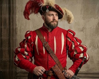 Peut inclure: Un pourpoint rouge et blanc de style Renaissance avec des manches bouffantes, porté avec une ceinture en cuir marron et un chapeau à plumes. Une épée est visible. Le texte "KNIGHT FORCE ARENA" est présent.