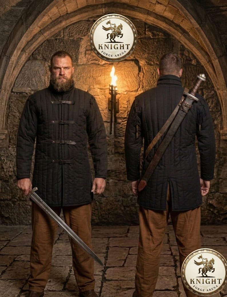 May include: Two men wearing black quilted jackets and brown pants stand in a stone archway. One holds a sword. The jackets have leather straps. The image includes a circular logo with a knight on a horse and the text "KNIGHT FORGE ARENA".
