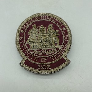 May include: A set of three ceramic mugs with a speckled, matte finish. The mugs are in shades of cream, light gray, and dark gray. Each mug has a simple, minimalist design and a rounded handle.