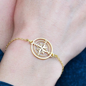 Ciondolo bussola, braccialetto bussola, regalo da viaggio, braccialetto delicato, amicizia a distanza, rosa dei venti, simbolo della bussola, regalo per escursionisti, gioiello da viaggio