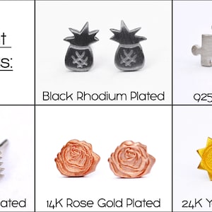 May include: Six pairs of earrings in different plating styles: black rhodium, sterling silver, white rhodium, rose gold, and yellow gold. The earrings feature various designs, including a money bag, puzzle piece, unicorn, rose, and sun.