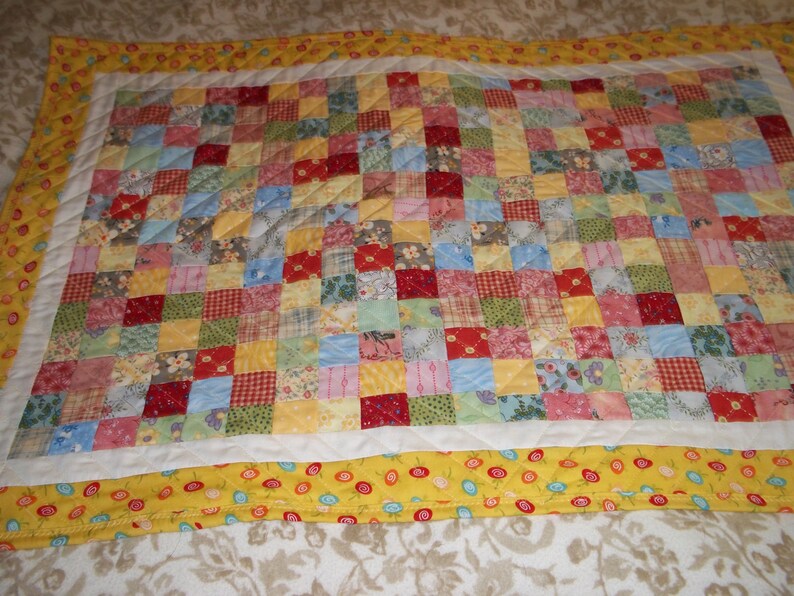 doll size quilt in 1 inch patchwork.