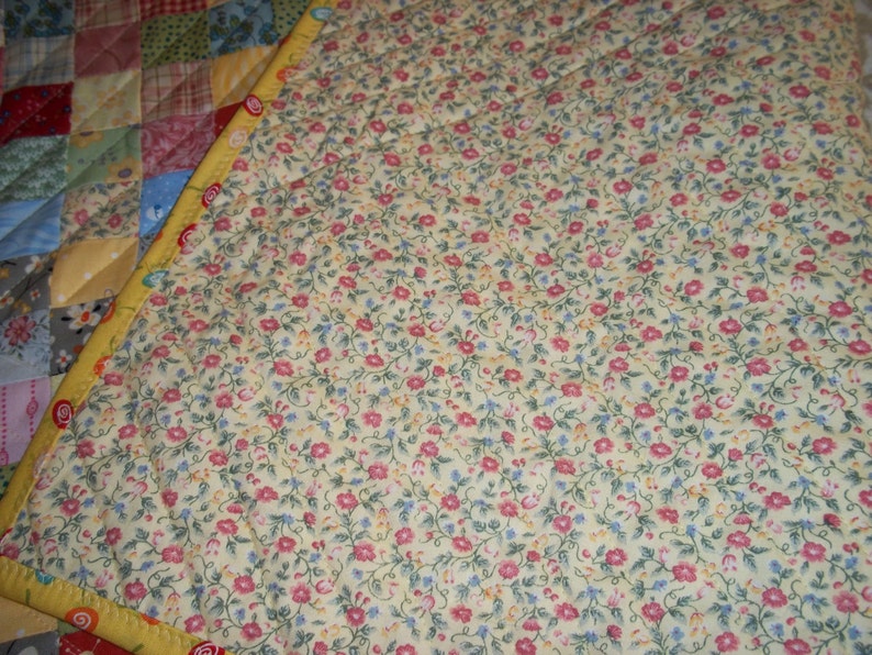 doll size quilt in 1 inch patchwork.