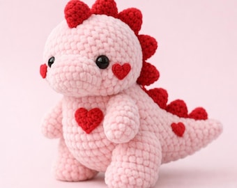 Dinosaurio de peluche a crochet hecho a mano / Dinosaurio amigurumi rosa con corazones