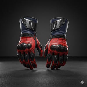 K&ouml;nnte beinhalten: Ein Paar rot-schwarze Motorradhandschuhe mit blauen Manschetten. Die Handschuhe haben eine schwarze Schutzpolsterung an Kn&ouml;cheln und Handfl&auml;chen. Der Markenname "CORO" ist auf der Manschette sichtbar.