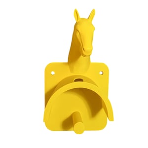 May include: A bright yellow horse head wall mount with a saddle-shaped holder and a peg. The horse head is sculpted with a smooth finish. The mount has two holes for easy installation. This item is designed for equestrian enthusiasts.