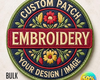 May include: A round embroidered patch with the text "CUSTOM PATCH" and "EMBROIDERY". The design includes floral elements in red, yellow, and green on a navy blue base, with a green border. The words "YOUR DESIGN / IMAGE" are also present.