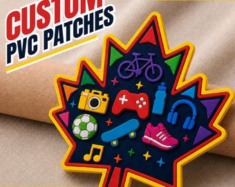 May include: A maple leaf-shaped PVC patch with a dark blue background and a yellow border. It features colorful raised icons including a bicycle, camera, game controller, water bottle, soccer ball, skateboard, sneaker, headphones, and musical note.