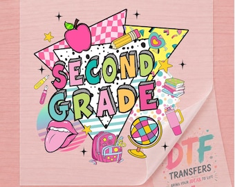 May include: A DTF transfer sheet featuring a colorful graphic with the text SECOND GRADE. The design includes a pink apple, yellow pencil, stack of books, globe, backpack, and lips. The background has geometric shapes, stars, and dots.