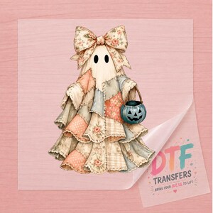 May include: A DTF transfer sheet featuring a ghost illustration with a large floral bow and a patchwork-style dress in muted pink, blue, and cream tones. The ghost holds a small teal jack-o'-lantern bucket. Text reads DTF TRANSFERS BRING YOUR IDEAS TO LIFE.