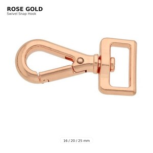May include: Rose gold swivel snap hook. The hook is a light, warm pink color. The text "ROSE GOLD Swivel Snap Hook" is at the top of the image. The hook is 16/20/25 mm in size.