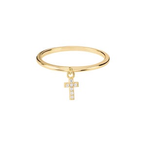 May include: A gold ring featuring a small, dangling cross pendant. The cross is embellished with tiny, clear gemstones. The ring's band is slender and polished, and the cross is suspended from a delicate loop.